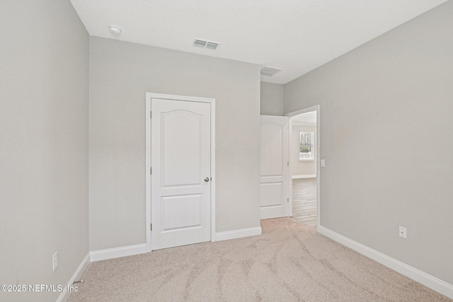 285 Greenway Ln, Saint Augustine, FL 32092 - unfurnished bedroom featuring carpet flooring and baseboards