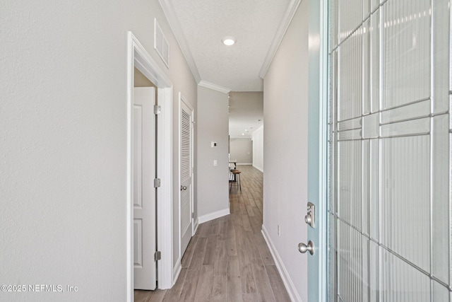 285 Greenway Ln, Saint Augustine, FL 32092 - corridor featuring baseboards, wood finished floors, crown molding, and recessed lighting