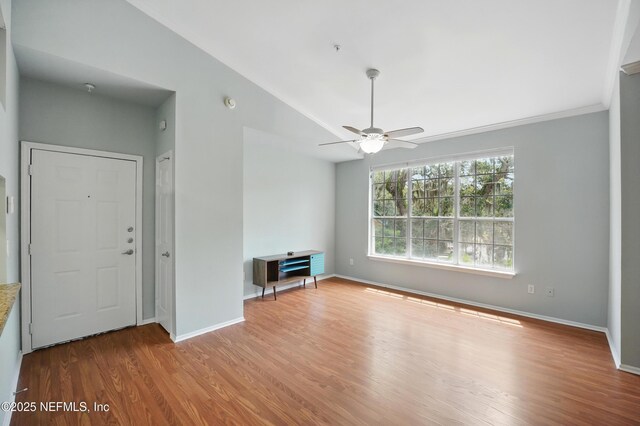 140 Veracruz Dr Unit 635, Ponte Vedra Beach, FL 32082 - unfurnished living room with wood finished floors, a ceiling fan, baseboards, and ornamental molding