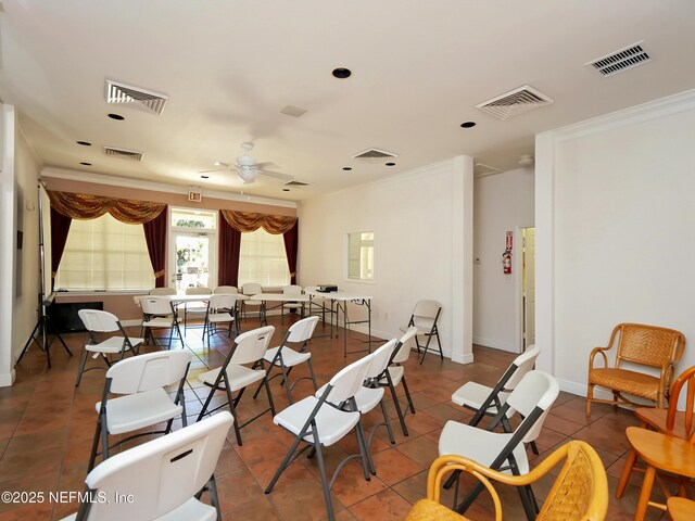 140 Veracruz Dr Unit 635, Ponte Vedra Beach, FL 32082 - dining room featuring crown molding, tile patterned floors, ceiling fan, and baseboards