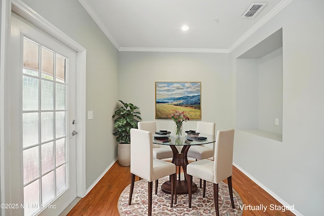 140 Veracruz Dr Unit 635, Ponte Vedra Beach, FL 32082 - dining area with wood finished floors, baseboards, crown molding, and recessed lighting