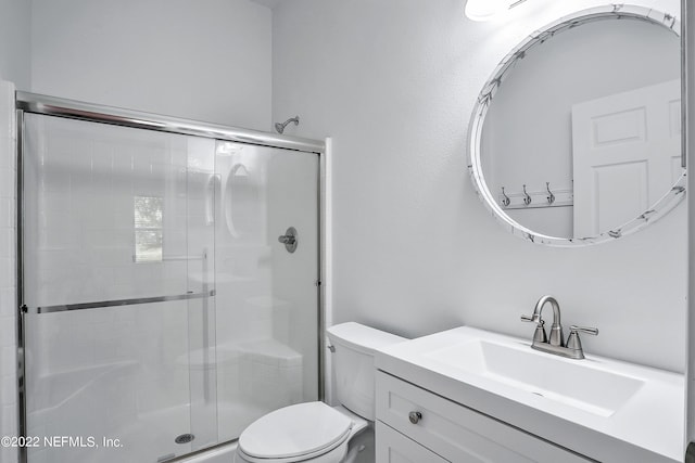 13793 Herons Landing Way Unit 4, Jacksonville, FL 32224 - bathroom with a stall shower, toilet, and vanity