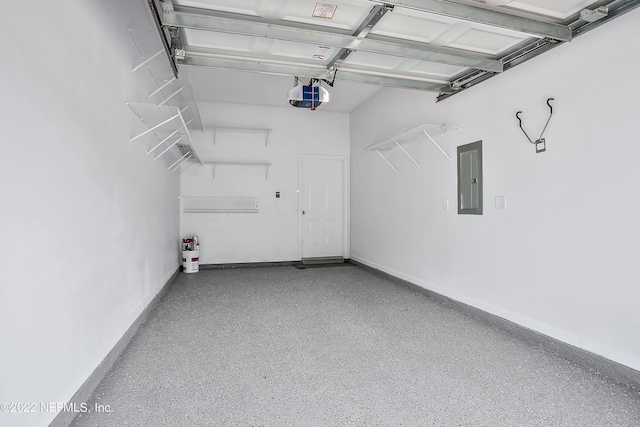 13793 Herons Landing Way Unit 4, Jacksonville, FL 32224 - garage featuring a garage door opener, electric panel, and baseboards