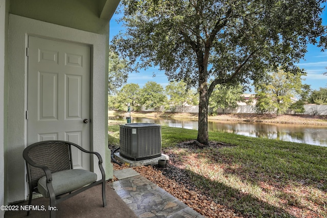 13793 Herons Landing Way Unit 4, Jacksonville, FL 32224 - view of yard with central air condition unit and a water view