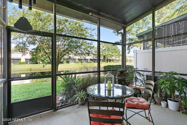 7542 Red Crane Ln, Jacksonville, FL 32256 - sunroom with a water view