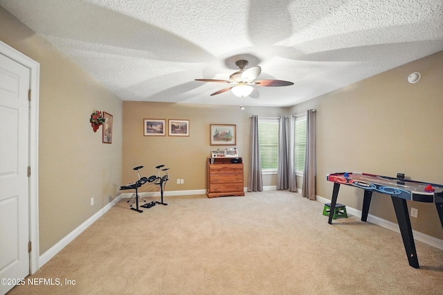 501 Greenbriar Rd, Saint Johns, FL 32259 - game room with ceiling fan, light carpet, a textured ceiling, and baseboards