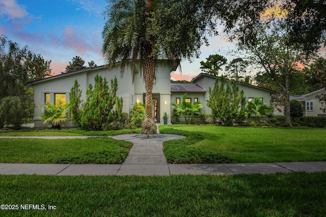 295 Sophia Ter, Saint Augustine, FL 32095 - view of front of house featuring stucco siding and a yard