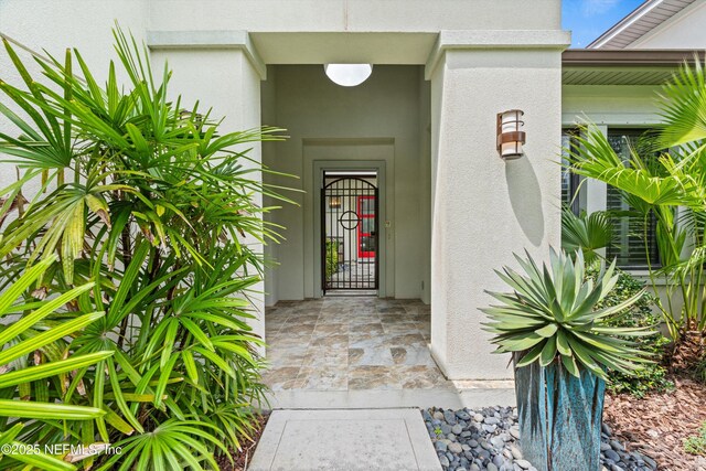 295 Sophia Ter, Saint Augustine, FL 32095 - view of exterior entry with stucco siding