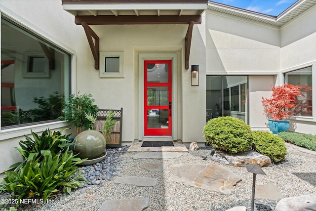 295 Sophia Ter, Saint Augustine, FL 32095 - doorway to property featuring stucco siding