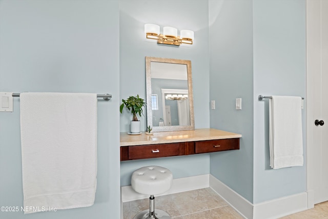 295 Sophia Ter, Saint Augustine, FL 32095 - bathroom featuring baseboards, vanity, and tile patterned flooring