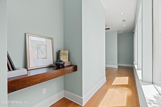 295 Sophia Ter, Saint Augustine, FL 32095 - hallway with wood finished floors, baseboards, and recessed lighting