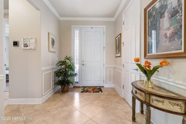 14 Marsh Hollow Rd, Ponte Vedra, FL 32081 - foyer entrance with a decorative wall, ornamental molding, wainscoting, and light tile patterned floors