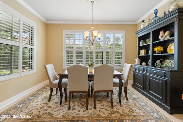 14 Marsh Hollow Rd, Ponte Vedra, FL 32081 - dining room with a chandelier, plenty of natural light, baseboards, and crown molding