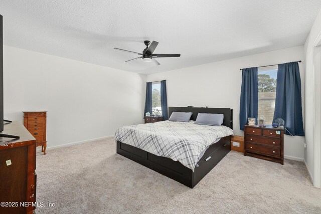 724 Liberty Cir, Macclenny, FL 32063 - bedroom featuring carpet, baseboards, and ceiling fan