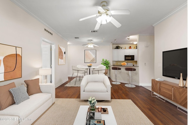 225 Presidents Cup Way Unit 105, Saint Augustine, FL 32092 - living area with ceiling fan, dark wood-style floors, ornamental molding, and baseboards