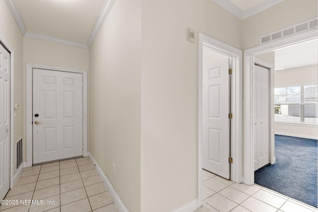 225 Presidents Cup Way Unit 105, Saint Augustine, FL 32092 - corridor featuring light tile patterned flooring, crown molding, and baseboards