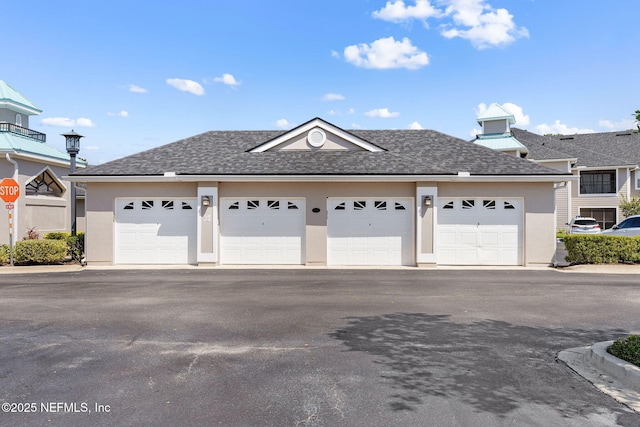 225 Presidents Cup Way Unit 105, Saint Augustine, FL 32092 - view of front facade featuring a shingled roof and stucco siding