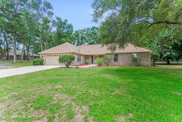 2270 Wilmhurst Rd, Deland, FL 32720 - single story home featuring a garage, driveway, a front yard, and brick siding