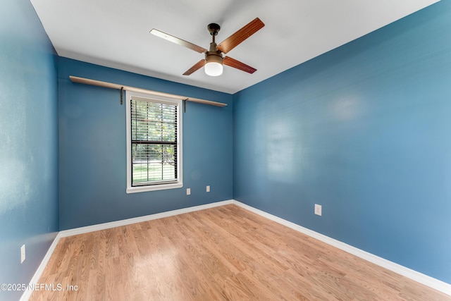 2270 Wilmhurst Rd, Deland, FL 32720 - empty room with a ceiling fan and wood finished floors