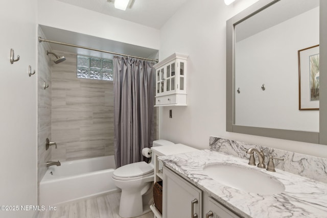 13674 Wm Davis Pkwy, Jacksonville, FL 32224 - bathroom featuring vanity, shower / tub combo with curtain, toilet, and wood finished floors
