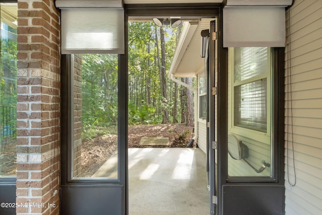 13674 Wm Davis Pkwy, Jacksonville, FL 32224 - doorway featuring healthy amount of natural light and a chandelier