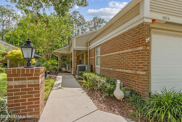 13674 Wm Davis Pkwy, Jacksonville, FL 32224 - entrance to property featuring central air condition unit and brick siding