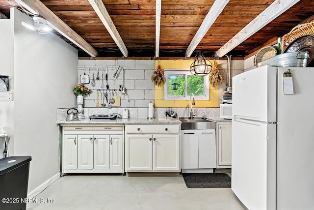1810 Griflet Rd, Jacksonville, FL 32211 - kitchen featuring white appliances, concrete flooring, a sink, wooden ceiling with exposed beams, and white cabinetry