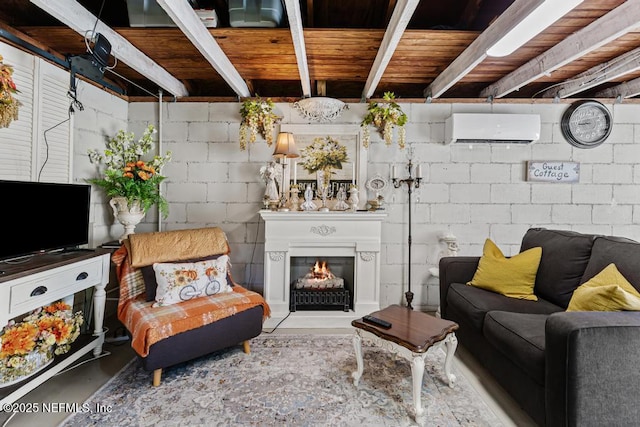 1810 Griflet Rd, Jacksonville, FL 32211 - living area featuring a wall unit AC, finished concrete floors, and a lit fireplace