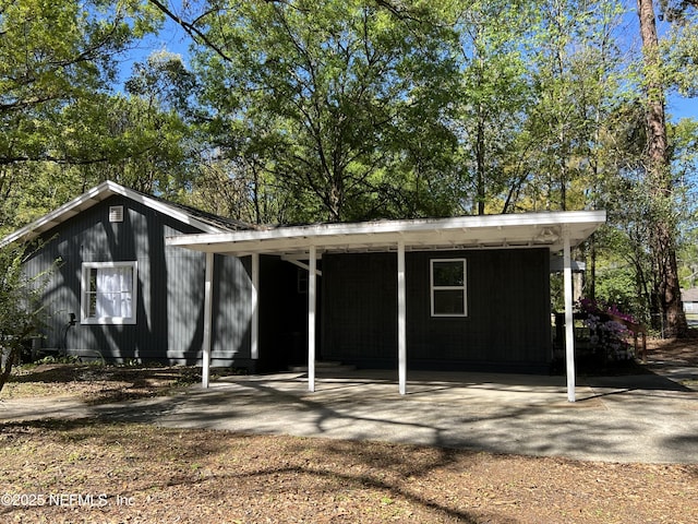 5256 Alpha Ave, Jacksonville, FL 32205 - view of front of home with a carport and driveway