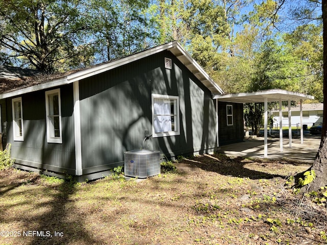 5256 Alpha Ave, Jacksonville, FL 32205 - view of home's exterior featuring central air condition unit and a carport
