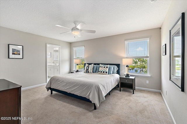 436 Marsh Cove Dr, Ponte Vedra Beach, FL 32082 - bedroom with multiple windows, light colored carpet, a textured ceiling, and a ceiling fan