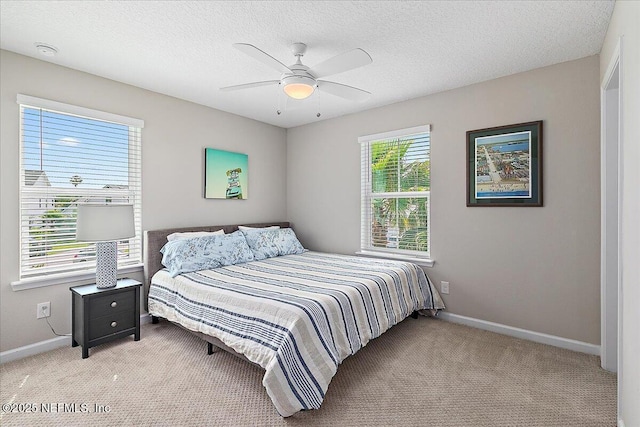 436 Marsh Cove Dr, Ponte Vedra Beach, FL 32082 - carpeted bedroom featuring ceiling fan and a textured ceiling