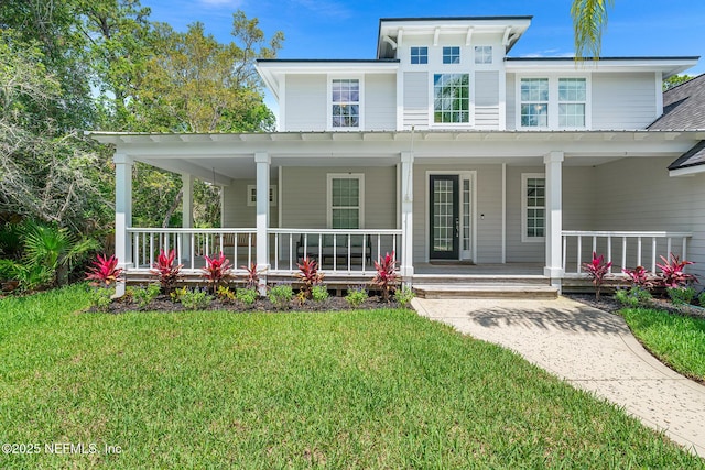 143 Istoria Dr, Saint Augustine, FL 32095 - view of front of house with covered porch and a front lawn