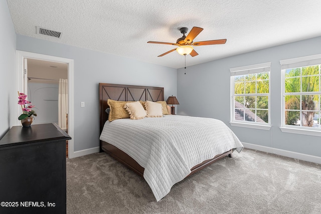 143 Istoria Dr, Saint Augustine, FL 32095 - bedroom with carpet floors, baseboards, a textured ceiling, and a ceiling fan