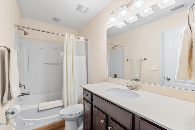 143 Istoria Dr, Saint Augustine, FL 32095 - full bath featuring vanity, shower / bath combo with shower curtain, toilet, wood finished floors, and a textured ceiling