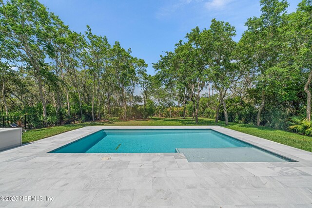 143 Istoria Dr, Saint Augustine, FL 32095 - outdoor pool with a patio, a lawn, and view of scattered trees