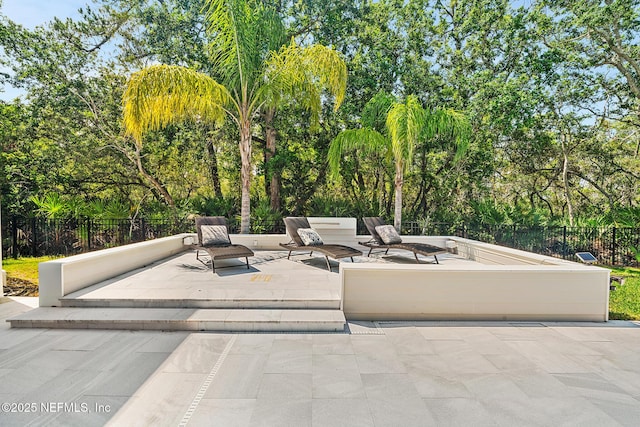 143 Istoria Dr, Saint Augustine, FL 32095 - view of patio / terrace with view of wooded area