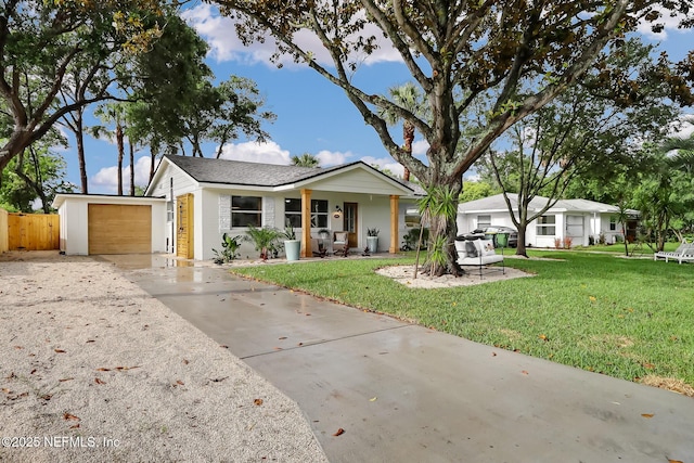 1031 14th Ave N, Jacksonville Beach, FL 32250 - ranch-style home with a garage, concrete driveway, and covered porch