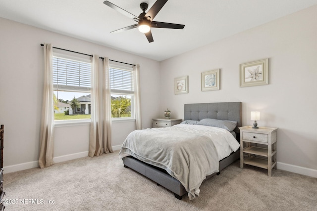 94001 Goodwood Dr, Fernandina Beach, FL 32034 - bedroom with baseboards, carpet flooring, and a ceiling fan