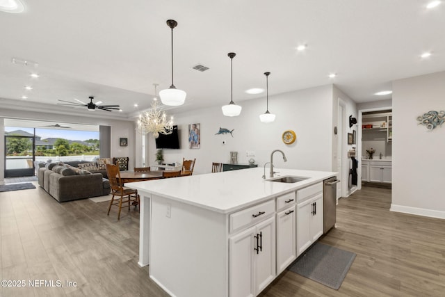 94001 Goodwood Dr, Fernandina Beach, FL 32034 - kitchen with a sink, light wood-style flooring, stainless steel dishwasher, recessed lighting, and ceiling fan