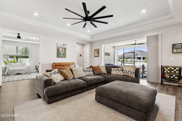 94001 Goodwood Dr, Fernandina Beach, FL 32034 - living area with wood finished floors, ceiling fan, a raised ceiling, crown molding, and recessed lighting