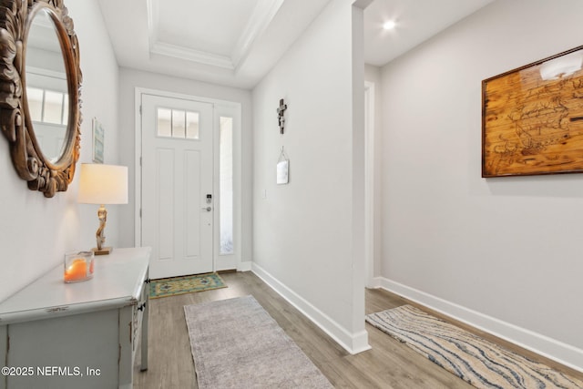 94001 Goodwood Dr, Fernandina Beach, FL 32034 - entrance foyer with wood finished floors, baseboards, crown molding, recessed lighting, and a tray ceiling