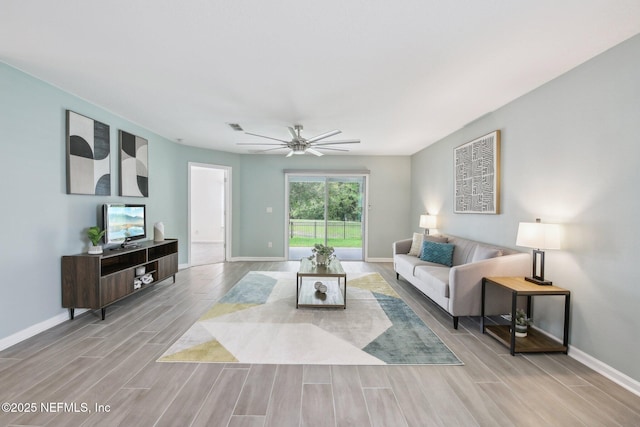 451 Sawmill Landing Dr, Saint Augustine, FL 32086 - living room featuring wood finished floors, baseboards, and ceiling fan