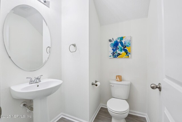 451 Sawmill Landing Dr, Saint Augustine, FL 32086 - bathroom featuring toilet and baseboards