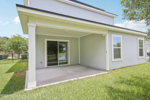451 Sawmill Landing Dr, Saint Augustine, FL 32086 - rear view of house featuring a patio and stucco siding