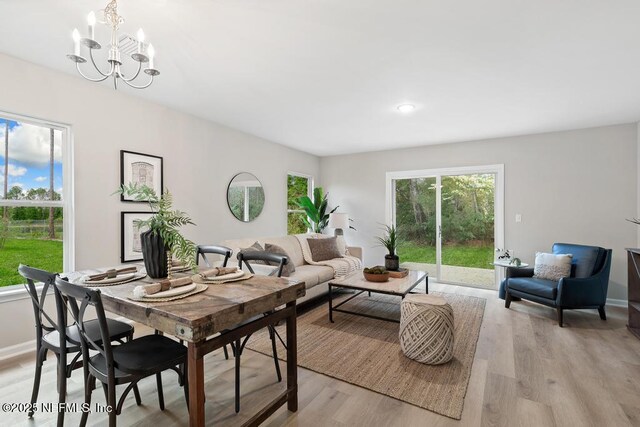 889 Aiken St, Saint Augustine, FL 32084 - dining area featuring light wood-style flooring, a chandelier, baseboards, and recessed lighting