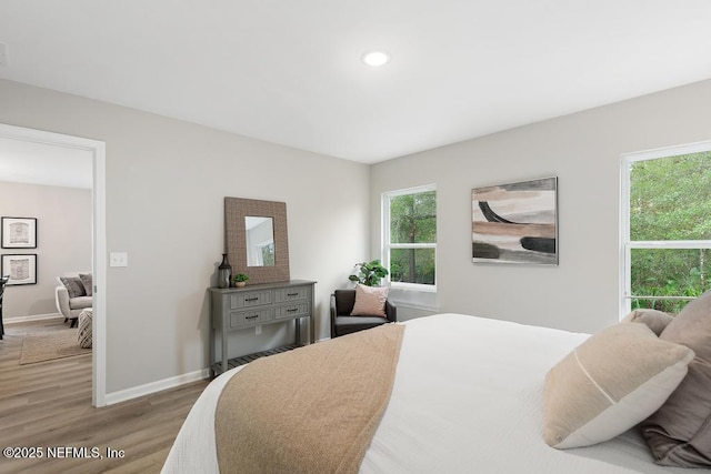889 Aiken St, Saint Augustine, FL 32084 - bedroom with light wood finished floors, baseboards, and recessed lighting