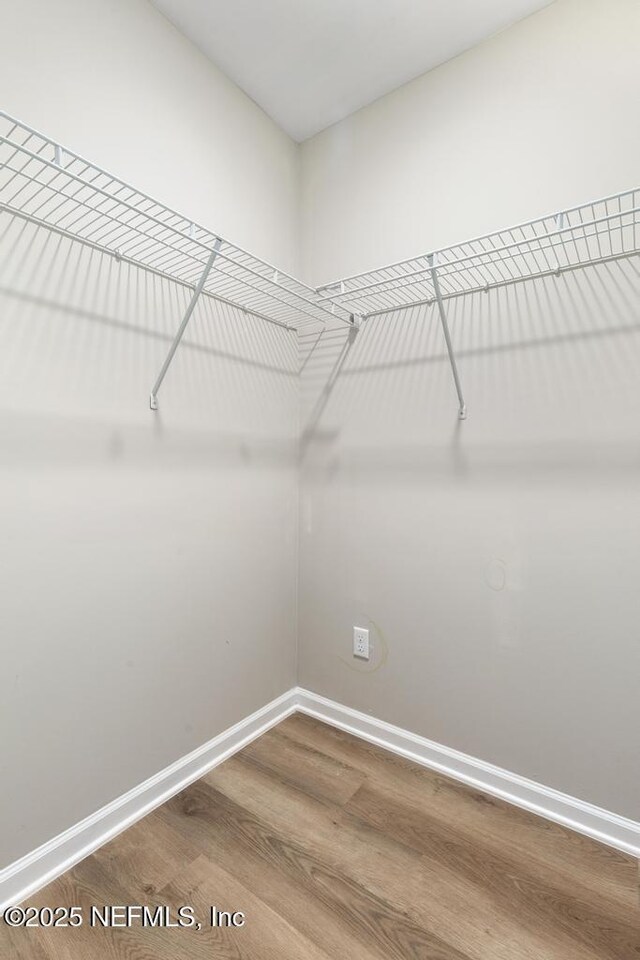 889 Aiken St, Saint Augustine, FL 32084 - spacious closet with wood finished floors
