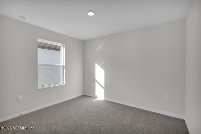 37330 Whisper Way, Hilliard, FL 32046 - unfurnished room featuring carpet flooring, baseboards, and a smoke detector
