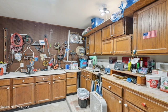 105 Solano Woods Dr, Ponte Vedra Beach, FL 32082 - kitchen featuring brown cabinetry and light countertops